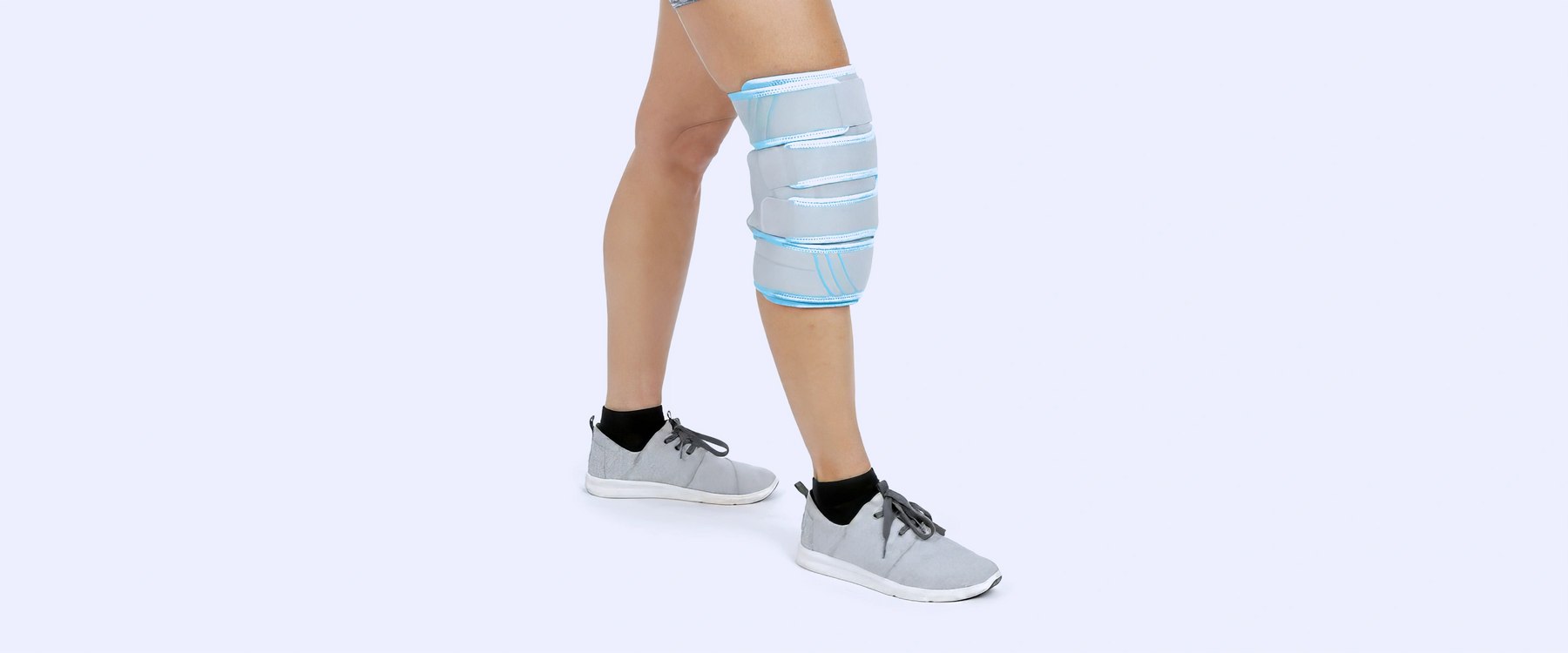 Knee ice wrap on leg