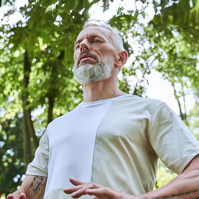 Man practicing breathing yoga