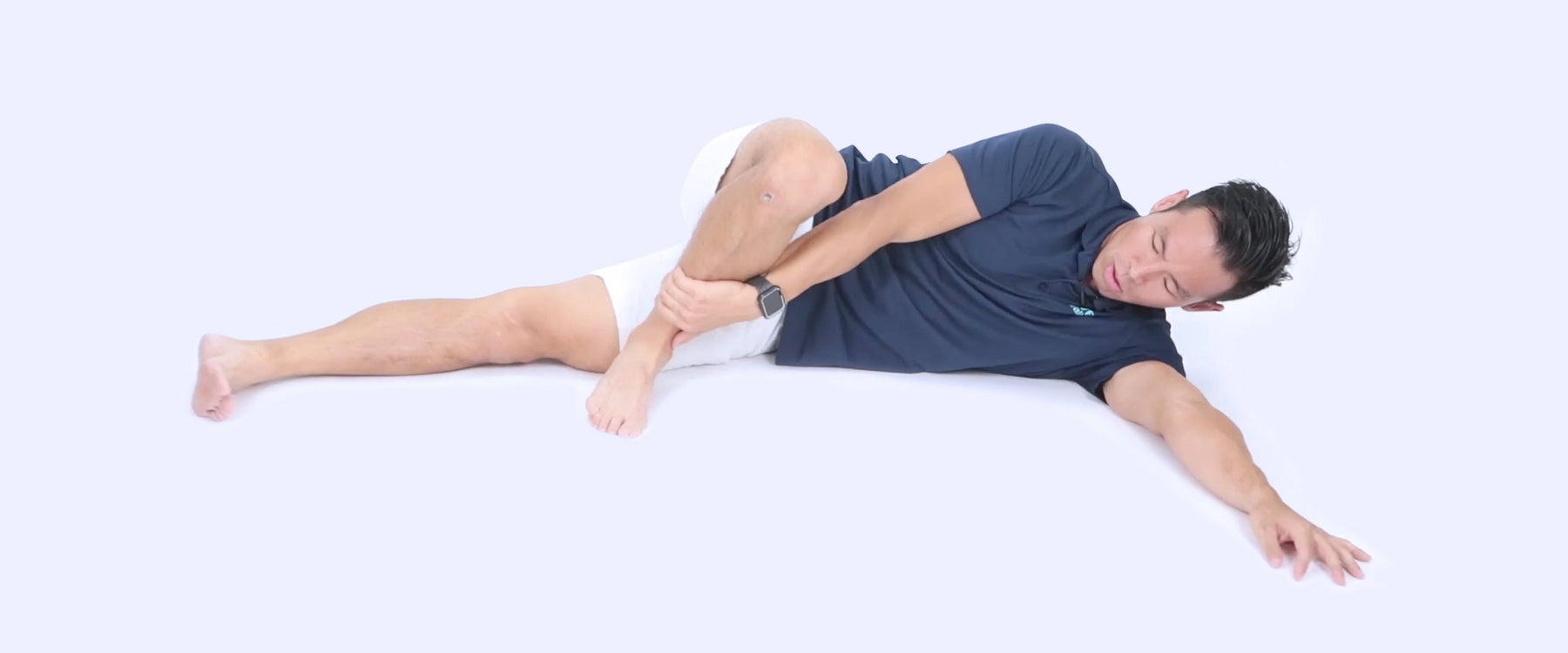 man stretching groin