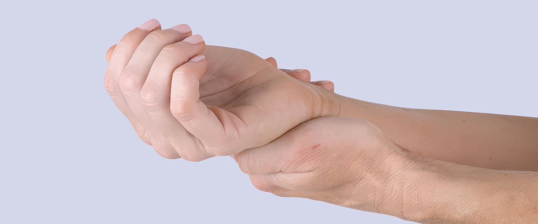 hand holding wrist
