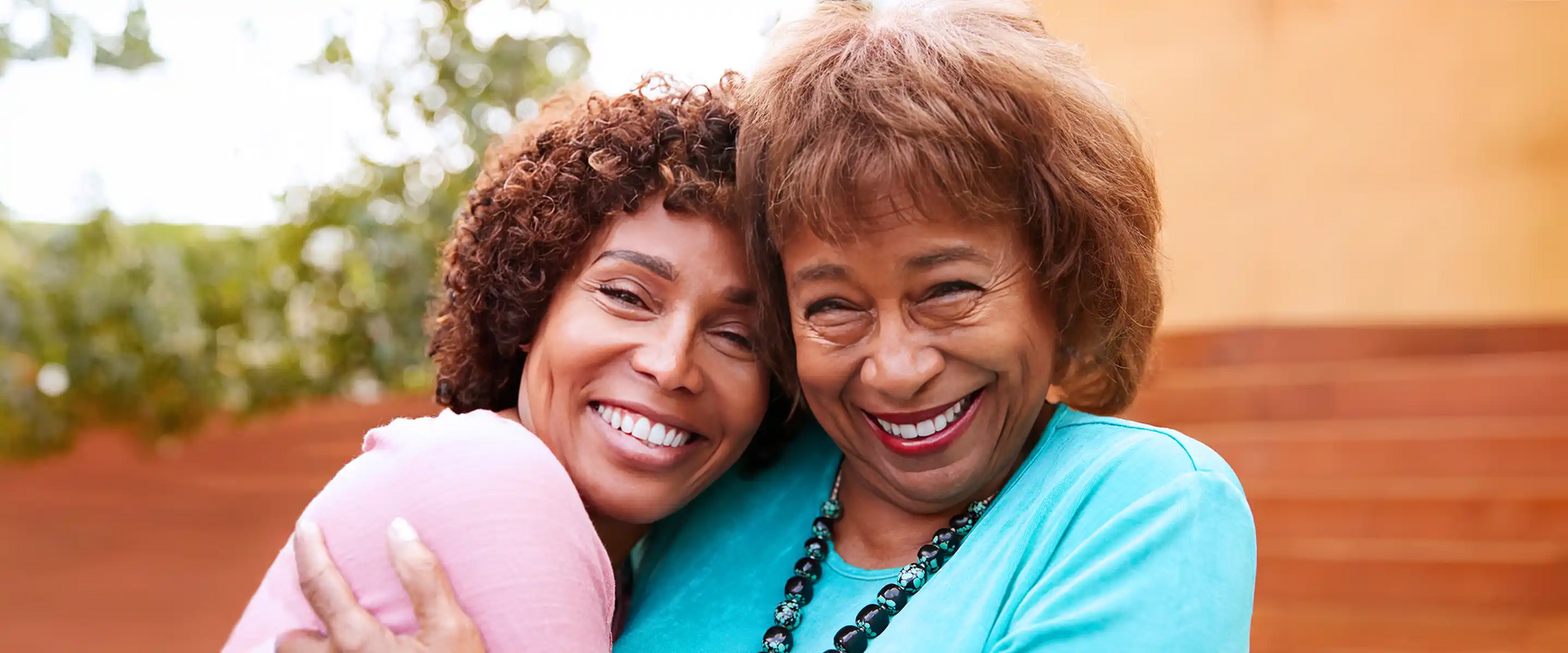 Senior woman and her middle aged daughter