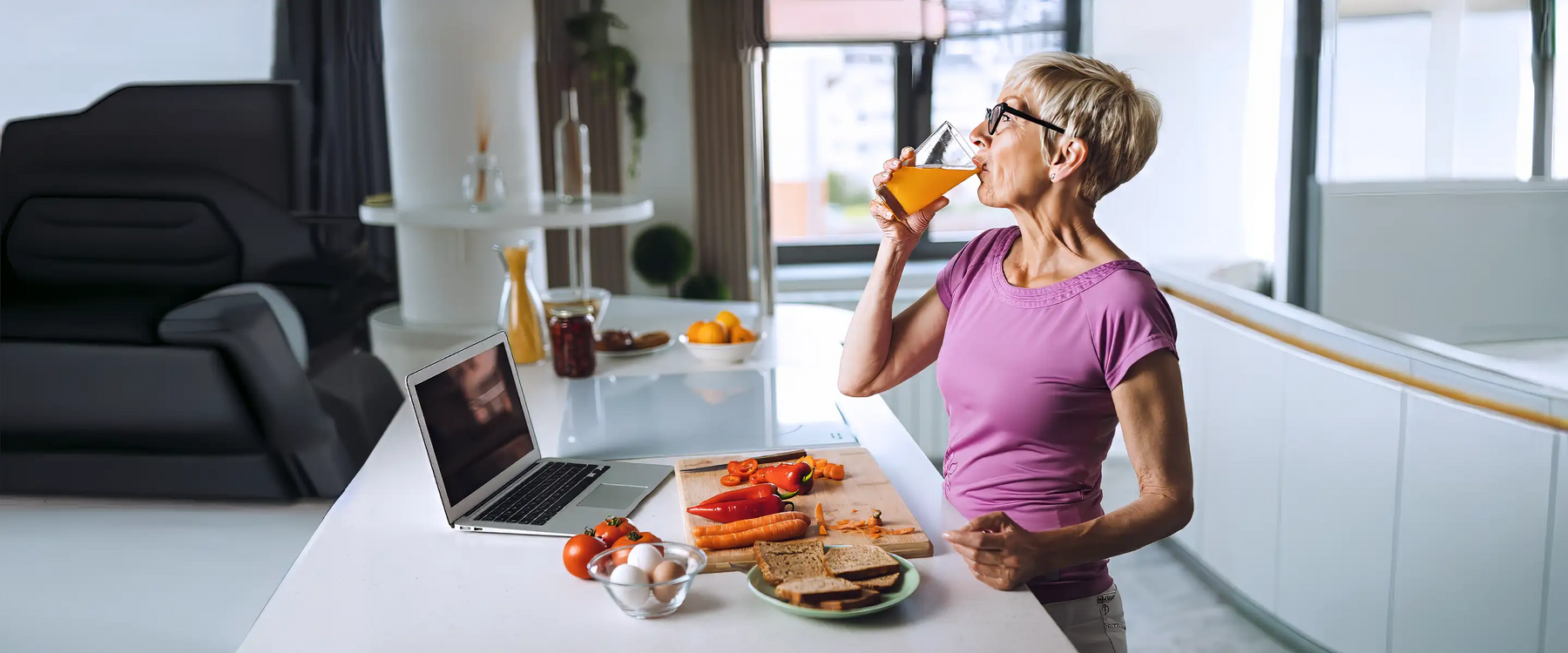 Senior woman drinking juice