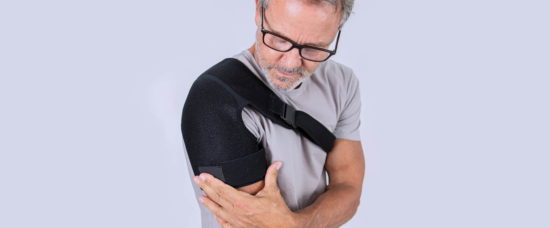 Senior with shoulder brace