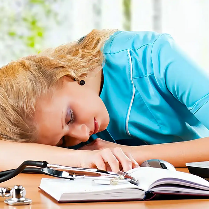 Stress caregiver sleeping  in the table
