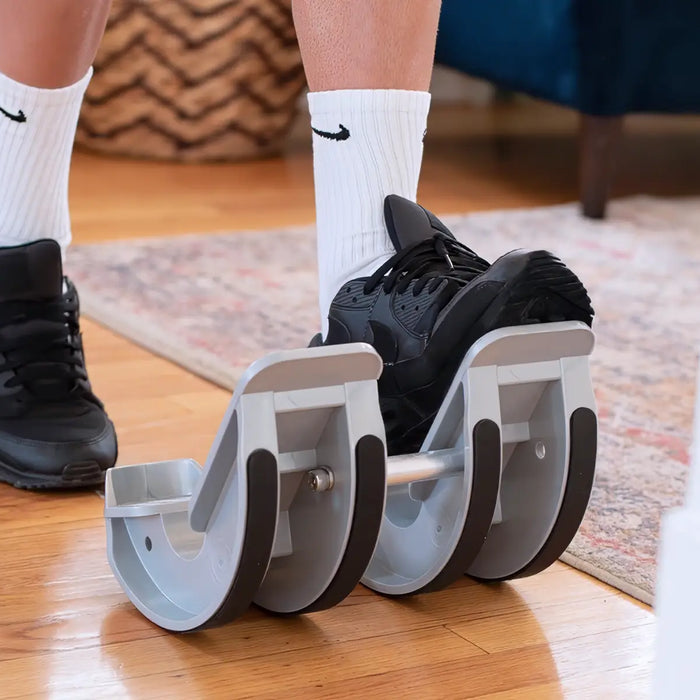 Stretching with calf stretcher
