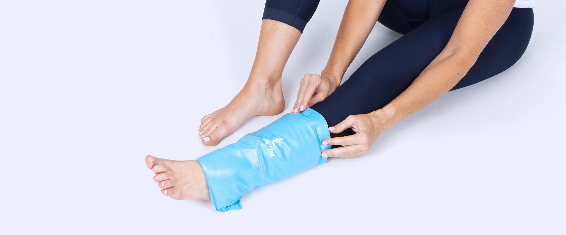 Woman icing shin