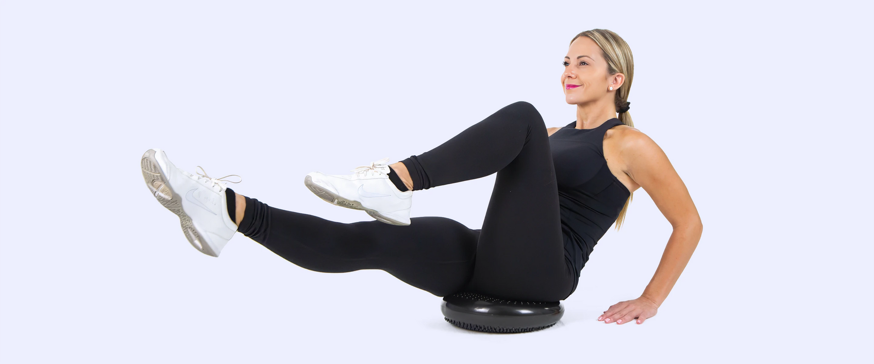 Woman performing ab exercise