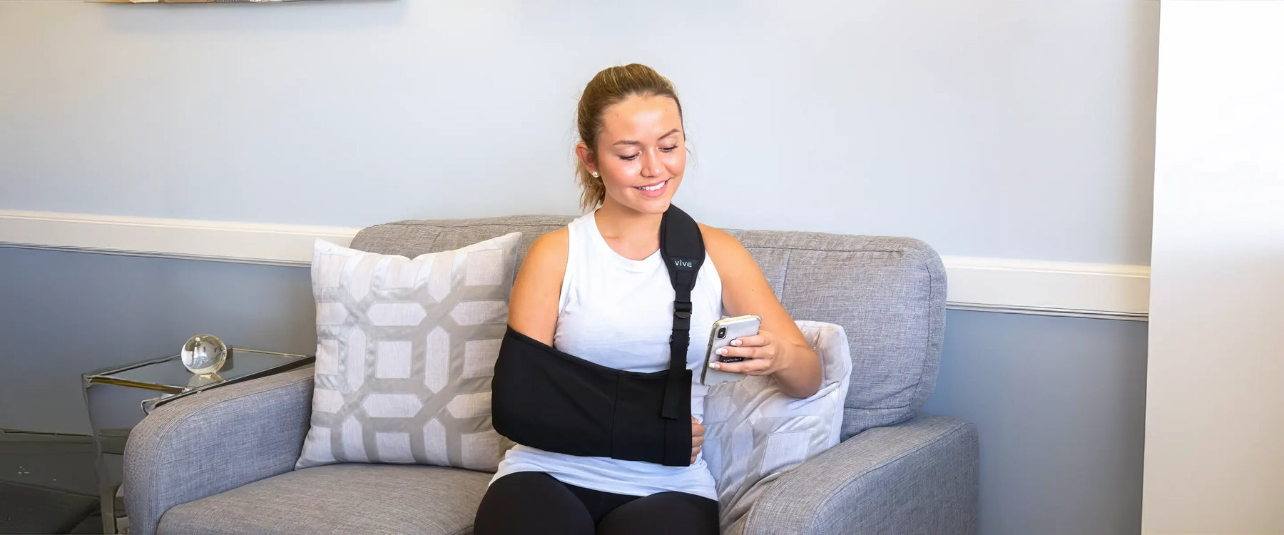 Woman with arm sling