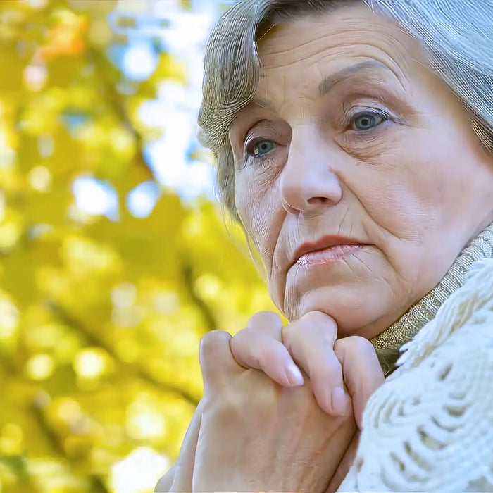 Elderly woman at nature