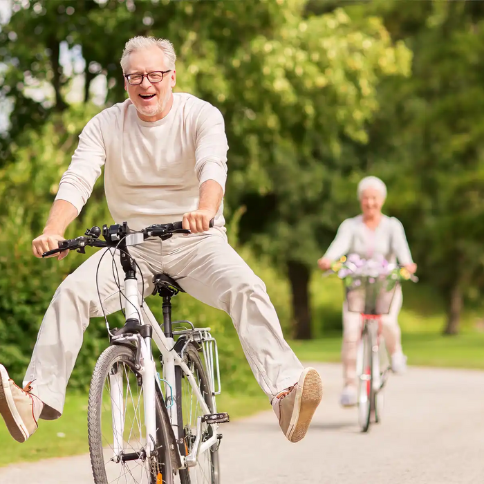 older man riding bike
