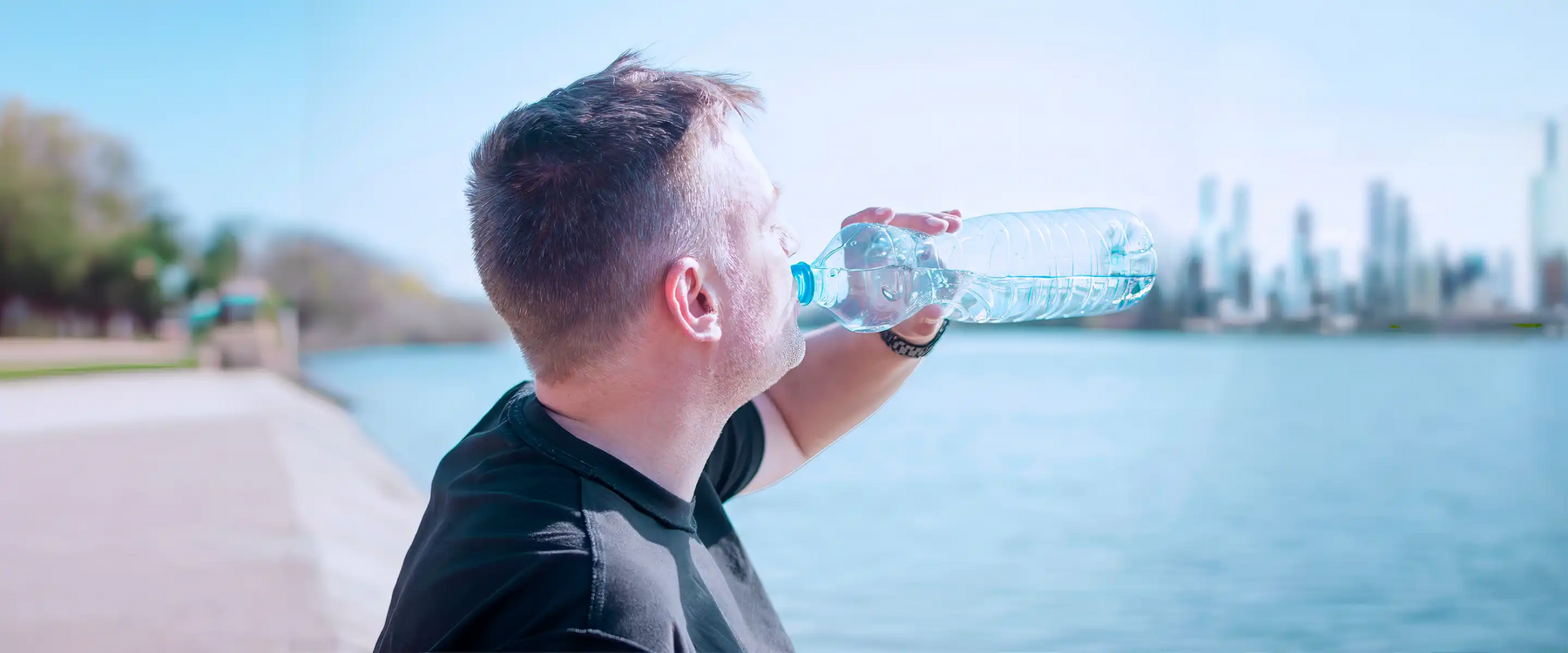 man drinking water