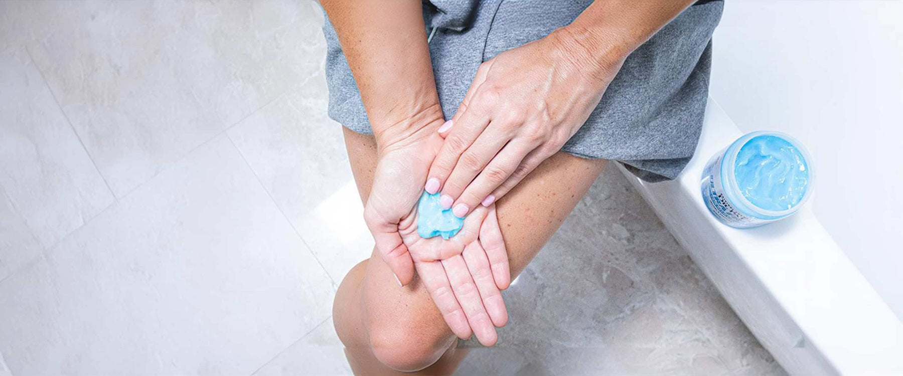 pain cream on hand