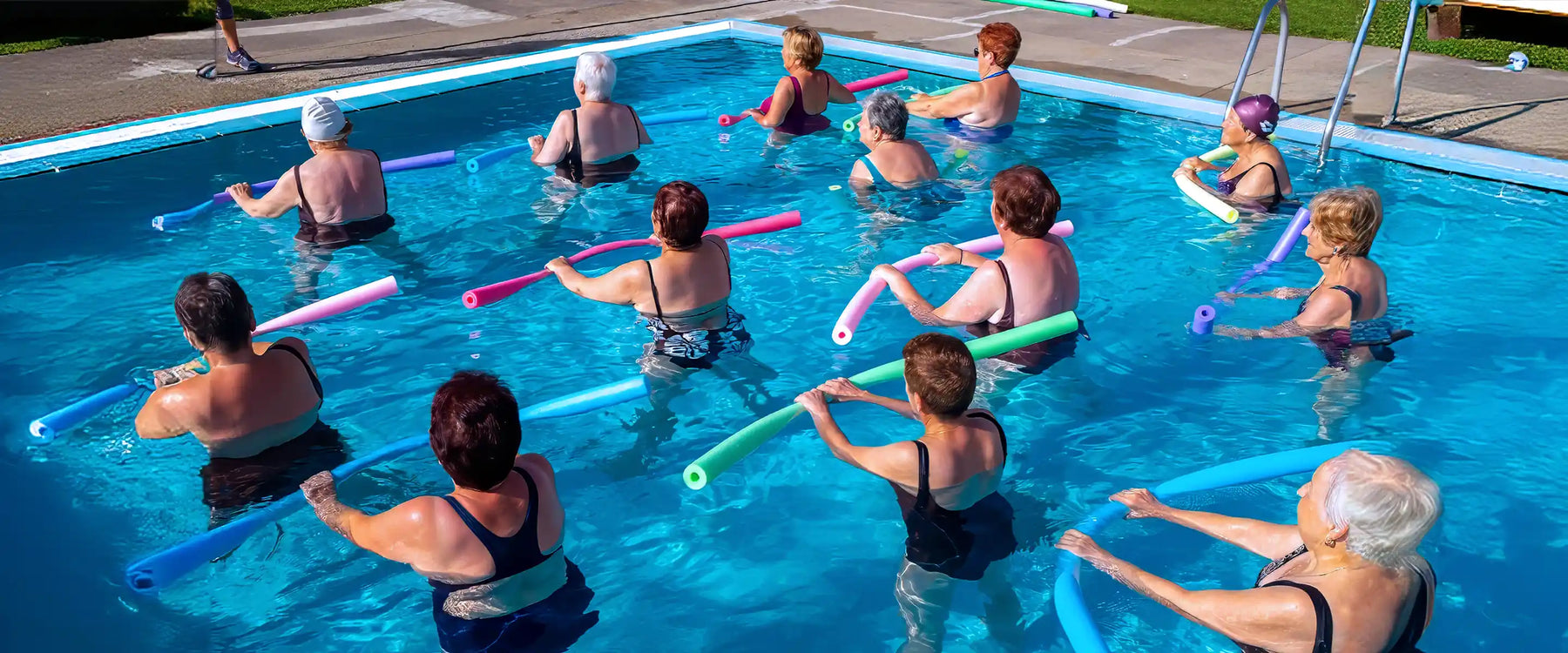 rear view senior aqua gym class