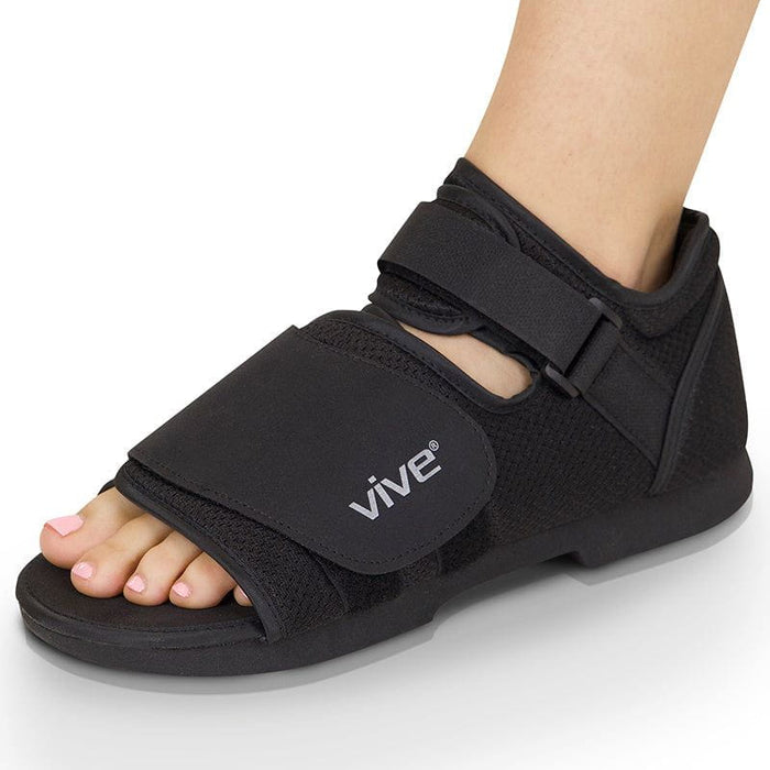 Rounded post-surgical boot with strong straps and roomy toe box for stable healing after injury.