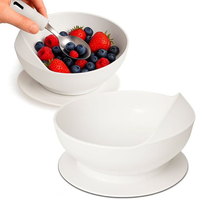 White scoop bowl with a spoonful of berries 