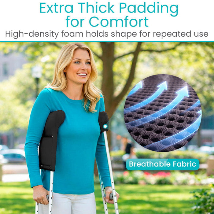 Woman using crutches with padding and fabric features highlighted, outdoors.
