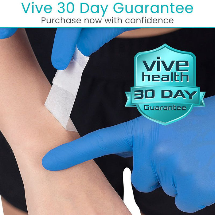 Person applying a patch to their arm with blue gloves, Vive Health 30 Day Guarantee badge visible.