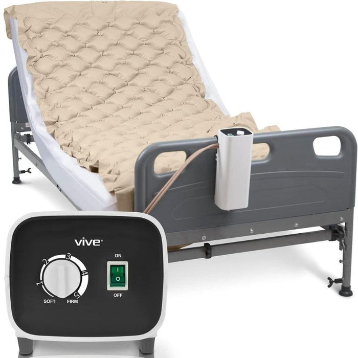 Alternating pressure pad shown fitted on a hospital bed with a control unit, highlighting its features like adjustable pressure 