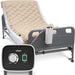 Alternating pressure pad shown fitted on a hospital bed with a control unit, highlighting its features like adjustable pressure 