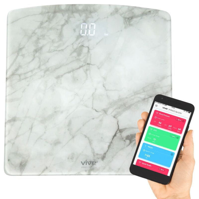 A digital marble smart scale with a smartphone displaying the scale's weight reading app. The scale has a white marble-like pattern and the smartphone is showing a colorful app interface.