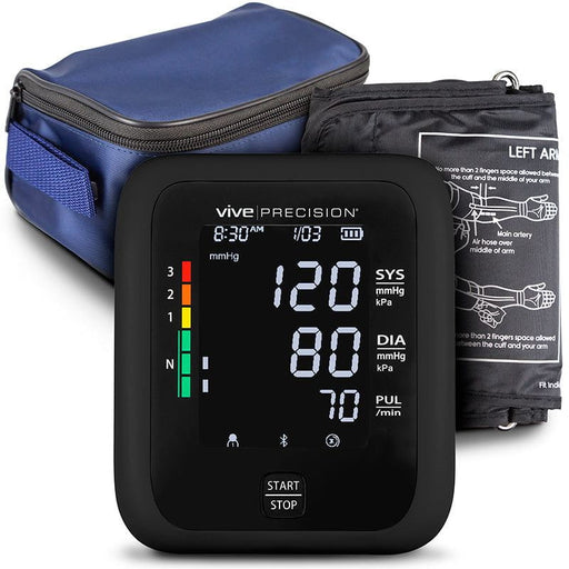 Vive Precision electronic blood pressure monitor with a digital LCD screen, accompanied by a wide range arm cuff and a carrying case, against a white background.