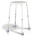 Compact white shower stool with textured seat, angled adjustable legs, and nonslip caps for safety & stability.